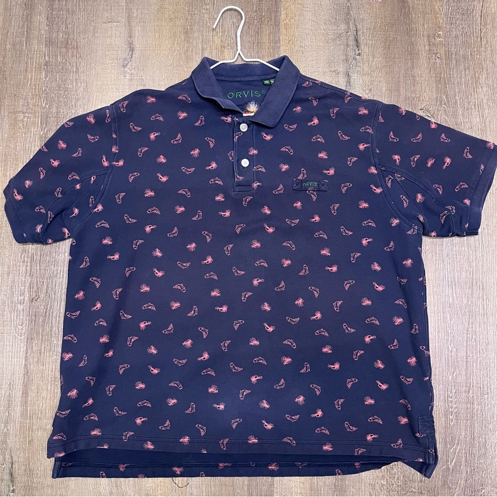 Orvis Men's Polo Shirt in Navy with Pink Fish Design